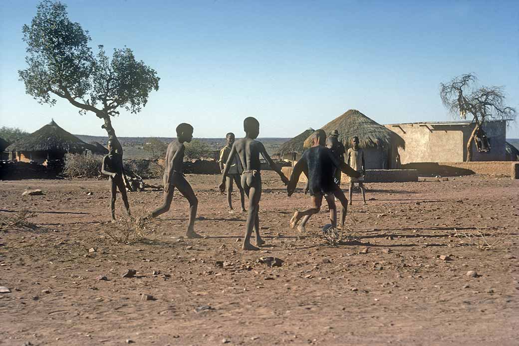 Boys playing football, Molepolole
