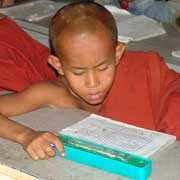 Young monk reading