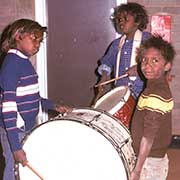 Beating a drum