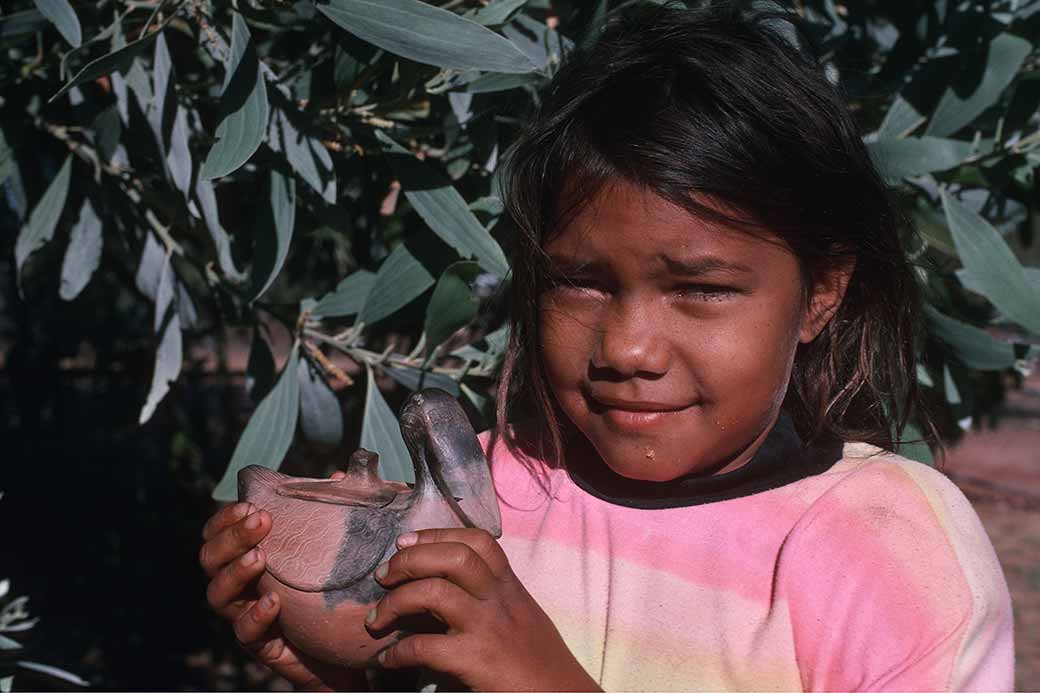 Girl with clay pot