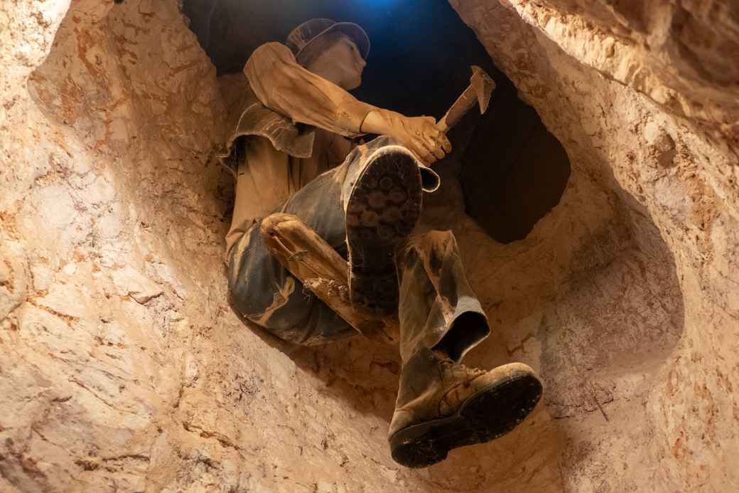 Mine worker in a shaft