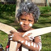 Boy with boomerangs