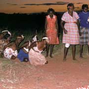 Women dance at dusk