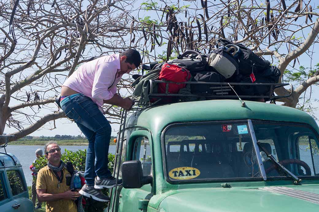 Loading luggage on the roof