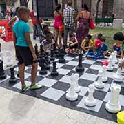 Boys playing chess, Havana