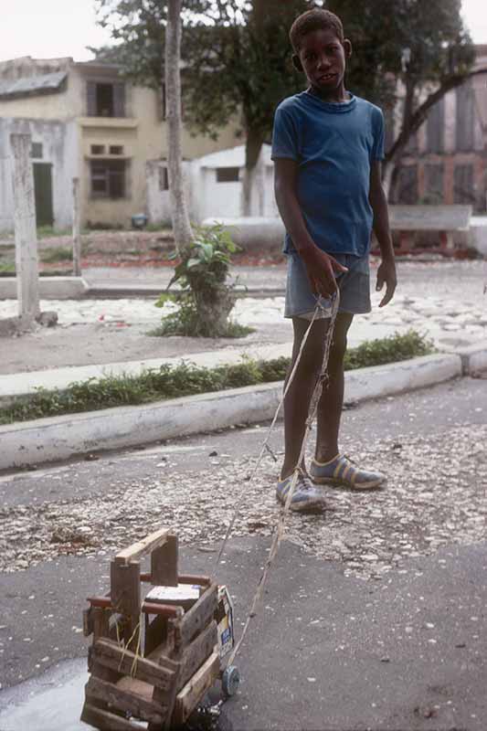 Boy with toy truck