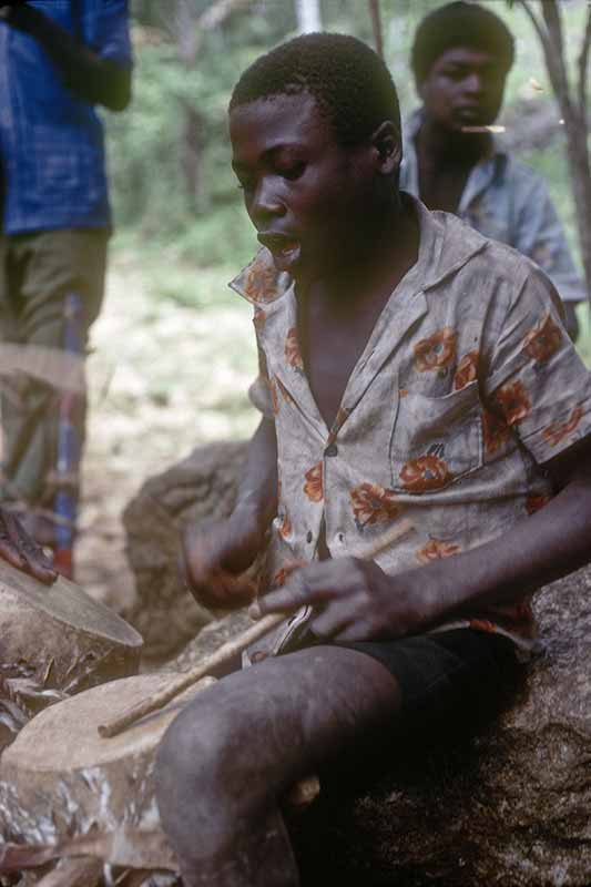 Drumming boy