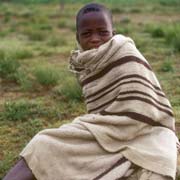 Boy in blanket