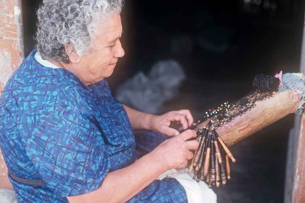 Woman doing lace work, Għarb