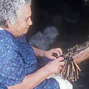 Woman doing lace work, Għarb