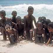Children posing on the beach, Onari