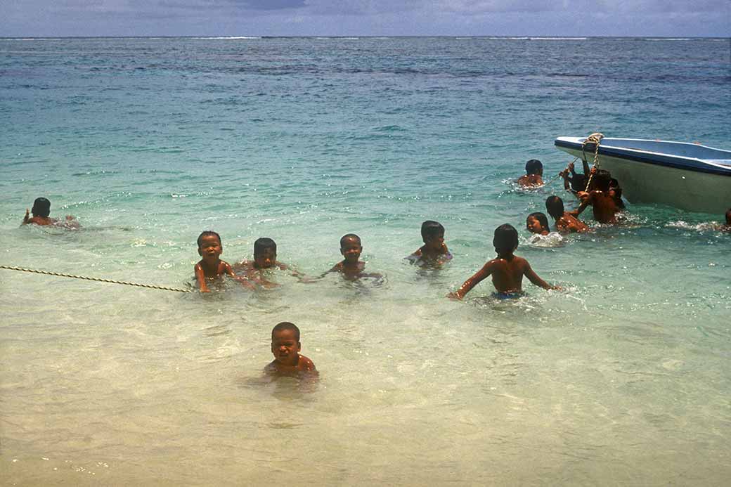 Children in Pulap atoll lagoon