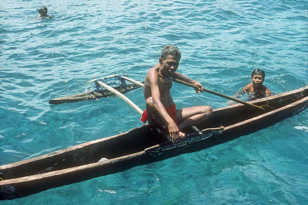 Man from Tamatam in canoe
