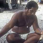 Man eating breadfruit, Sorol