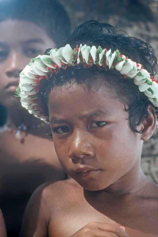 Boy with flower wreath