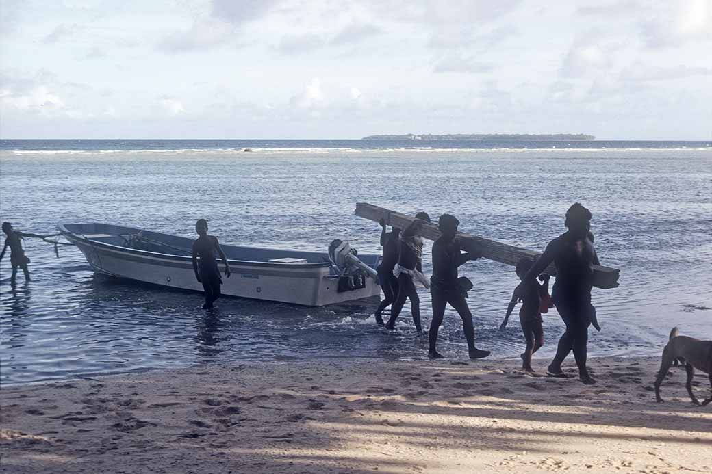 Boat and view to Falalis, Woleai