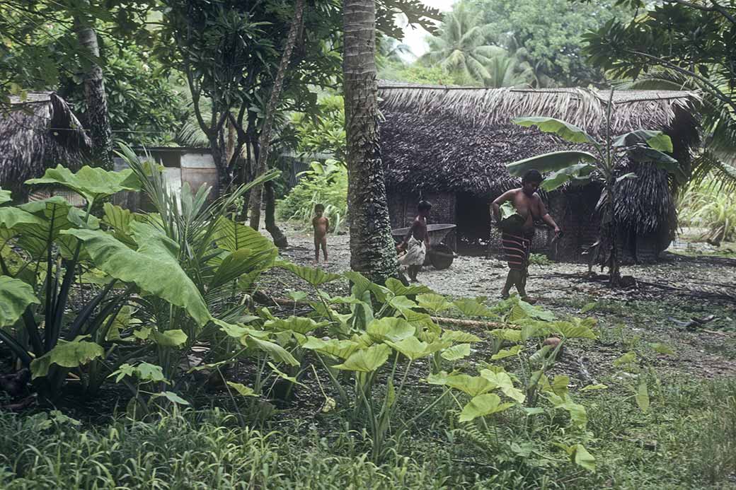 Children, traditional house, Satawal