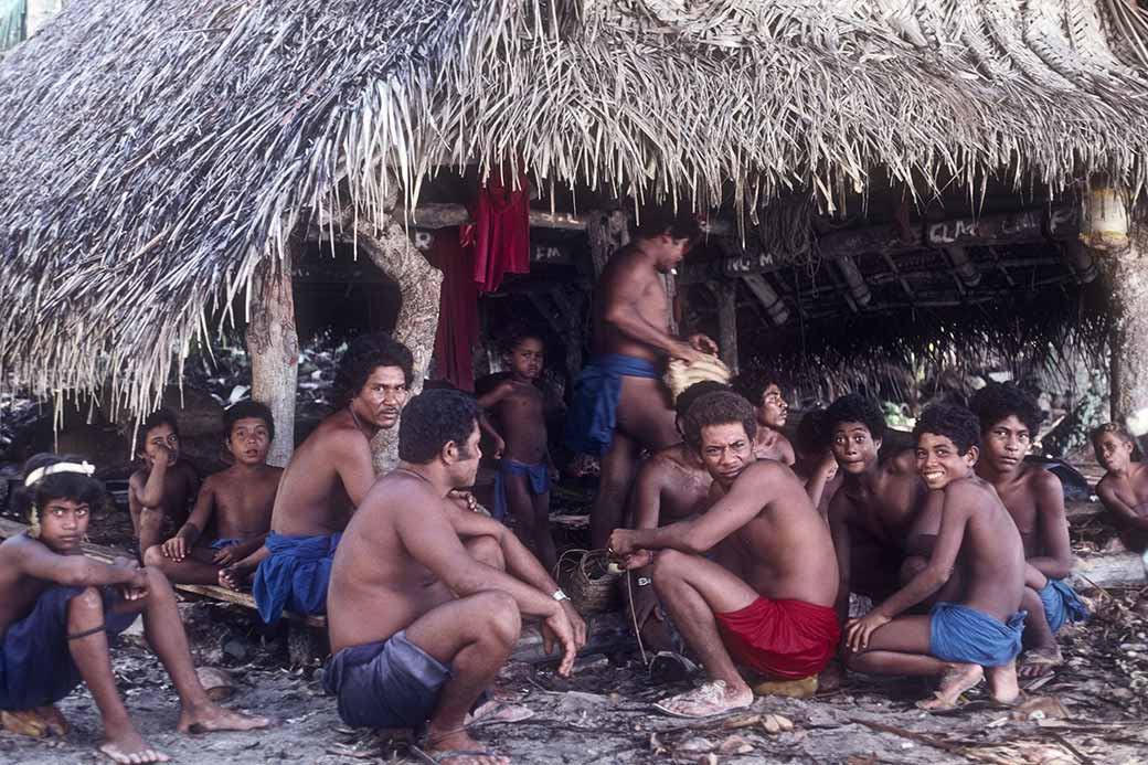 Men and boys at canoe house