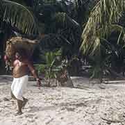 Men carrying copra