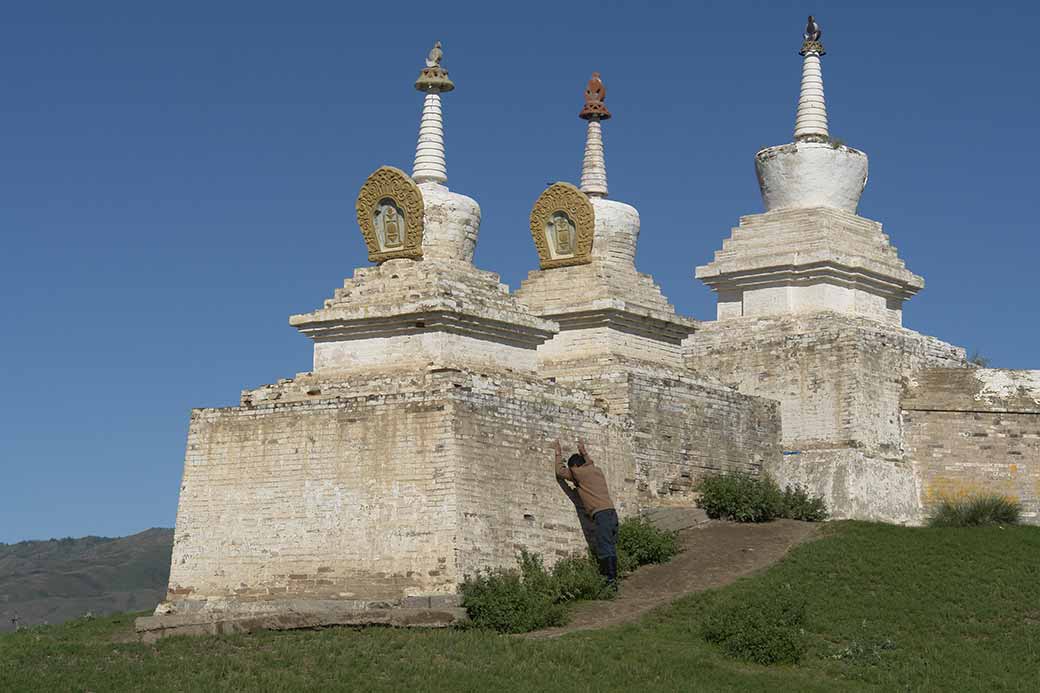 At the temple wall