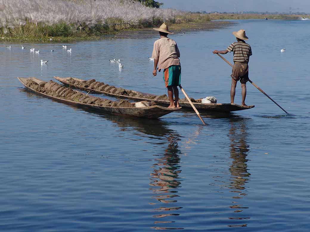 Two men rowing