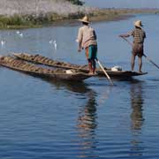 Two men rowing