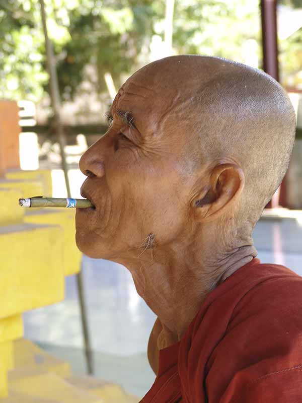 Abbot with cigar