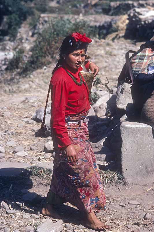 Young woman fetching water