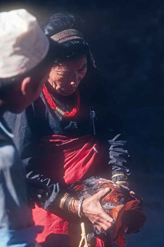 Woman buying a chicken