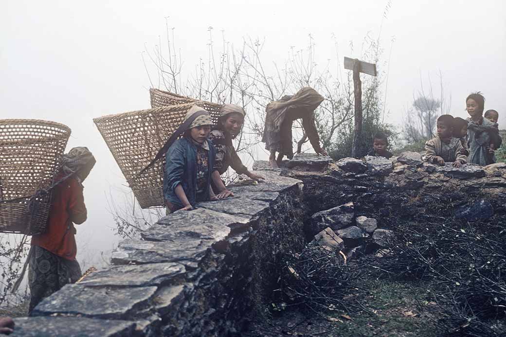 Women with carrying baskets