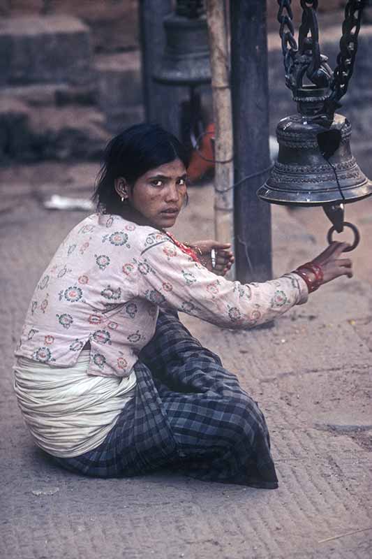 Woman ringing a bell,