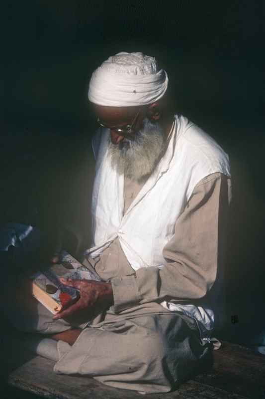 Old man with a book