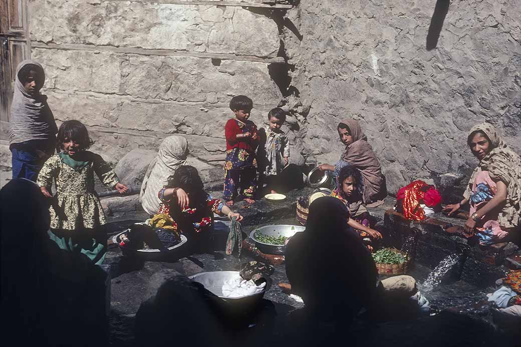 Women and girls washing