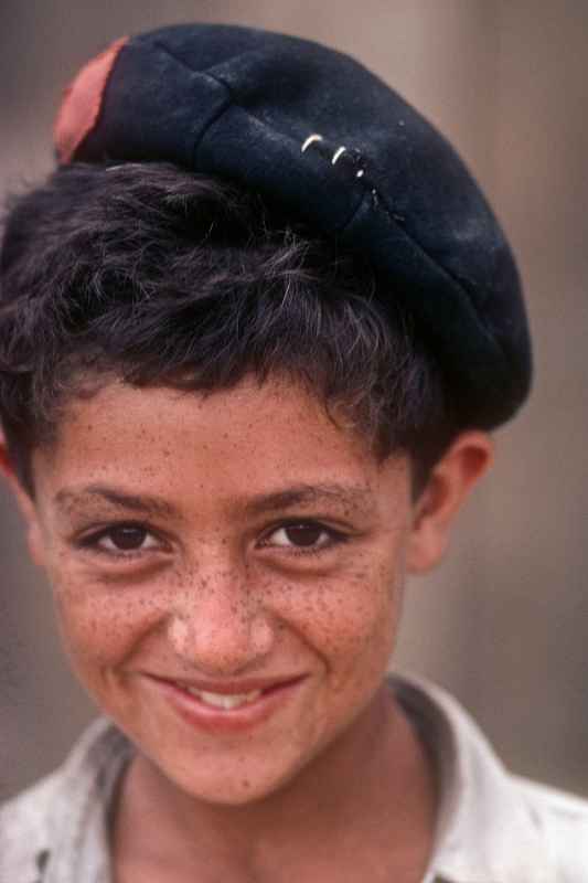 Boy wearing school cap