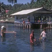 Fishermen with canoes