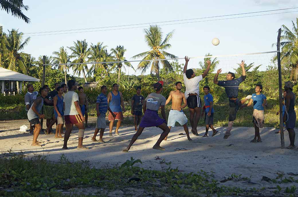 Playing volleyball