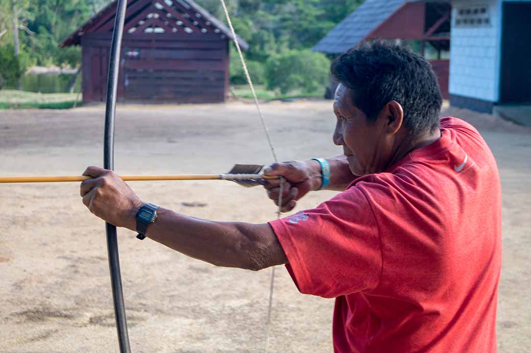 Demonstrating bow and arrow