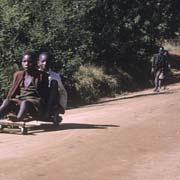 Boys race downhill