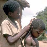 Combing his hair