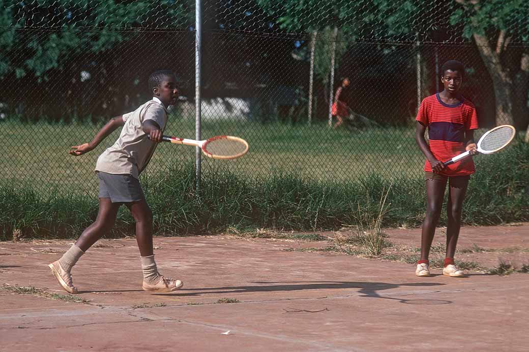 Boys playing tennis