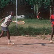 Boys playing tennis