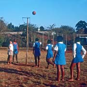 Girls play basketball