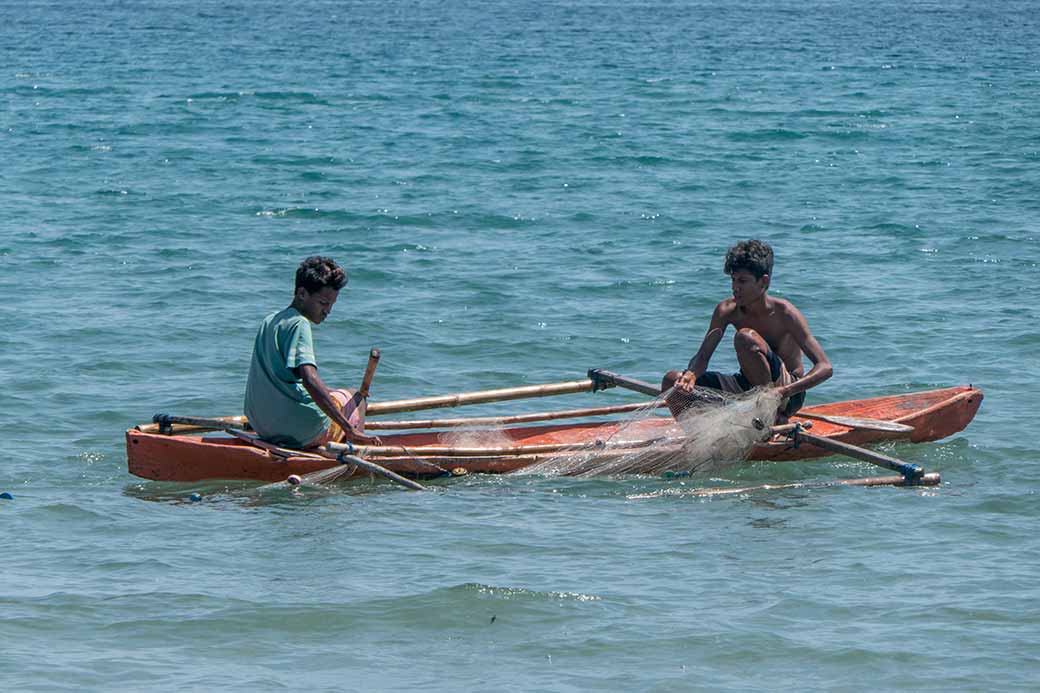 Fishing from a canoe