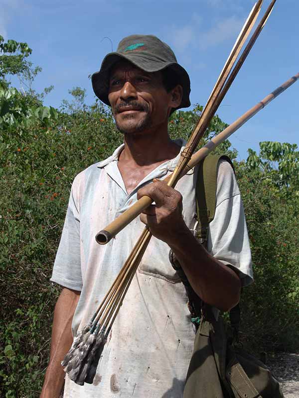 Man with blowgun