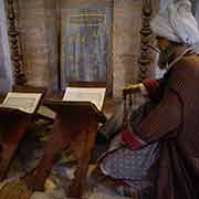 Display of a boy being taught