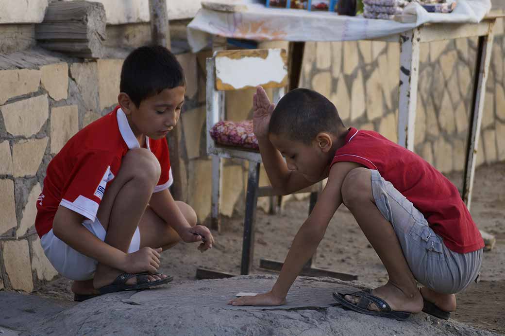 Boys playing cards