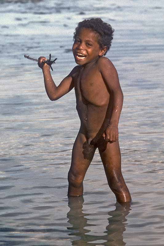 Boy with fish spear